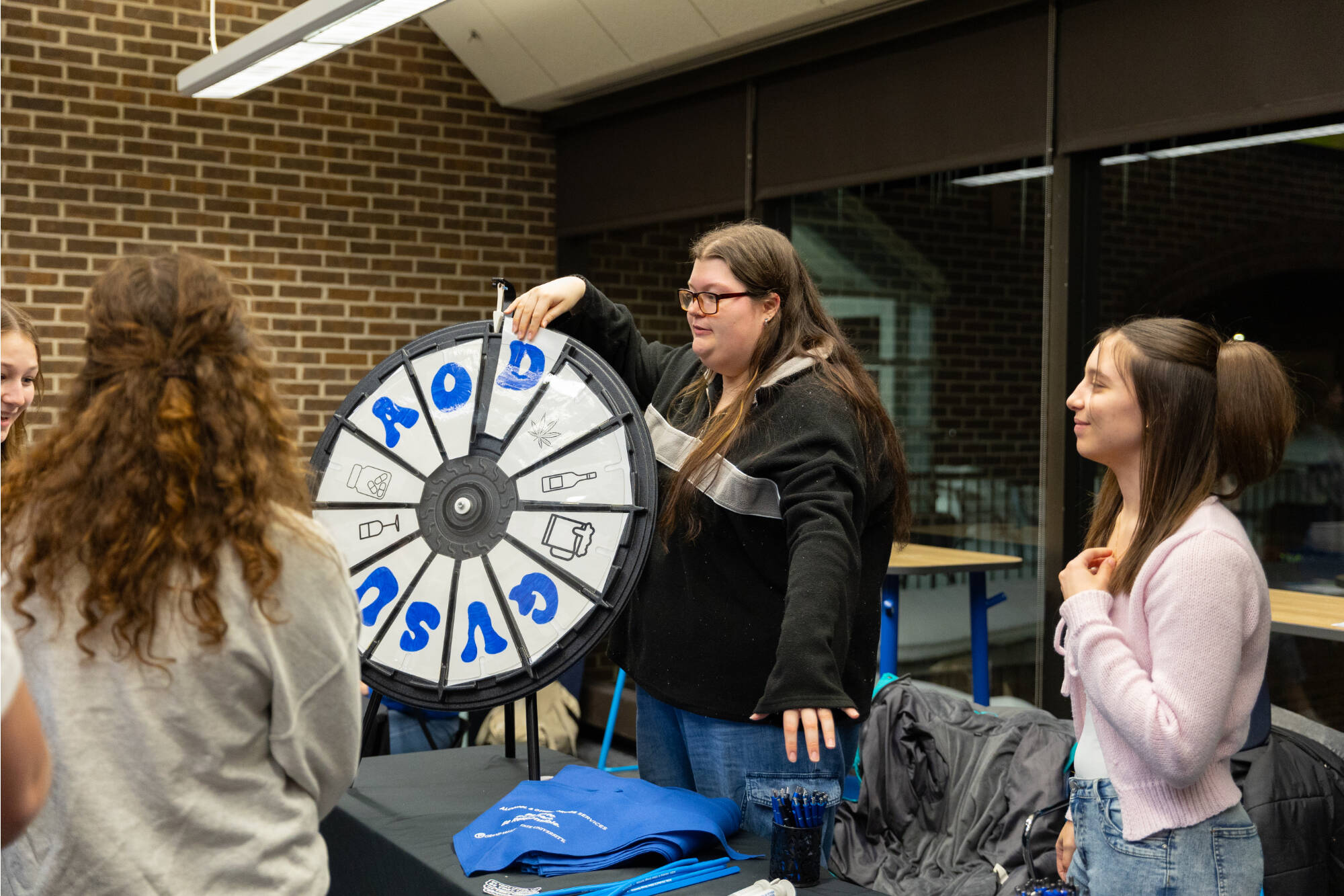 AOD staff spinning their prize wheel